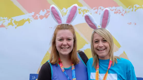 2 women with bunny ears