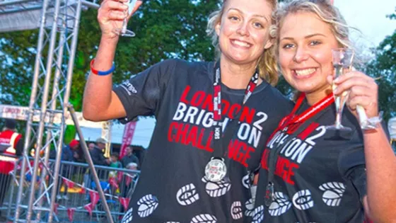 2 ladies smiling in London 2 Brighton challenge tshirts