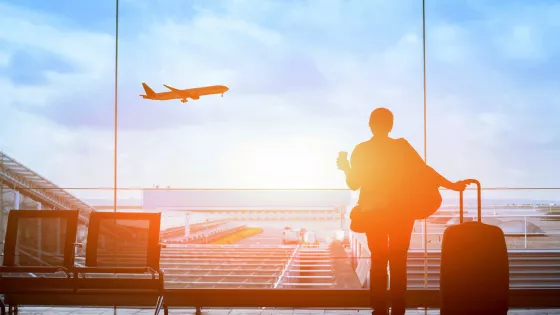 person waiting at a boarding gate