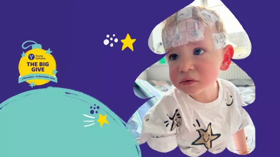 Baby with electrodes on his head for Big Give campaign