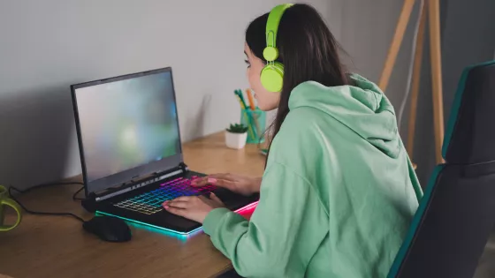 Young girl on her laptop for a Virtual Youth Club