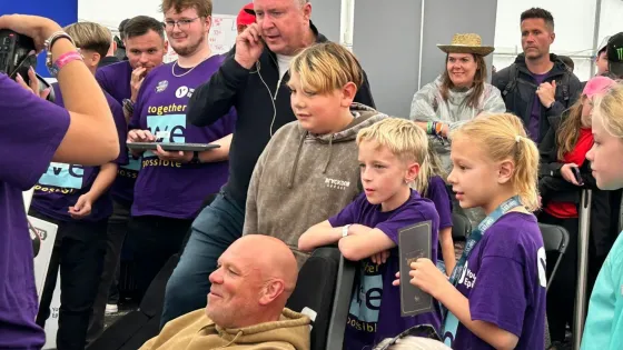 A group gathers for Purple Day.