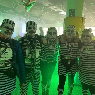 Group in prisoners halloween fancy dress