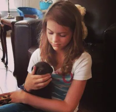 young girl and a puppy