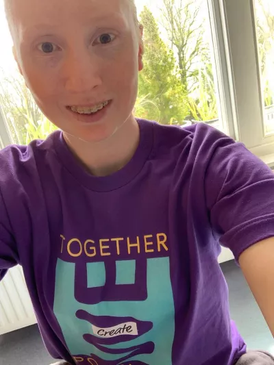 Sacha in a young epilepsy t shirt