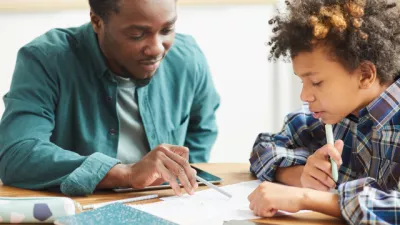 Teacher and pupil in classroom