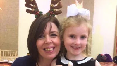 Young girl smiles with nurse