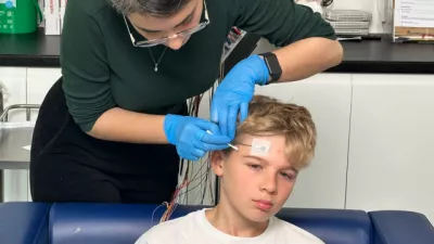 Young boy having EEG