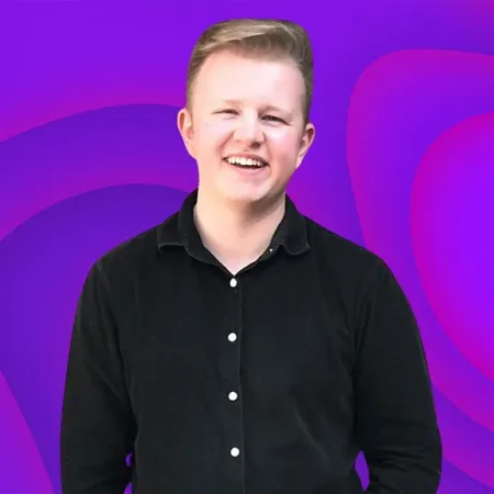 Jake Peach stands against a BBC Sounds background.