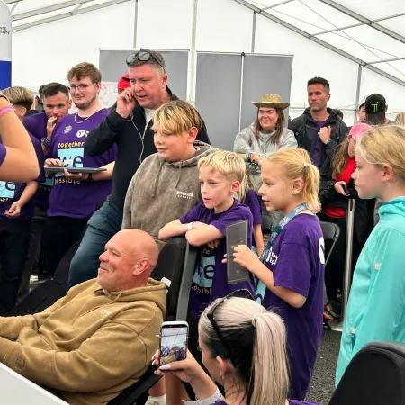 A group gathers for Purple Day.