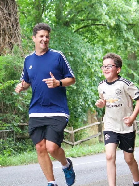 Zac and his dad running