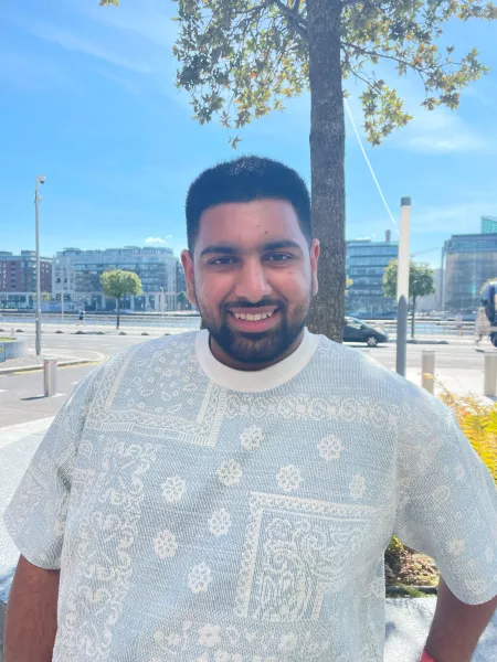 young man smiling in the sun