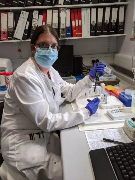 a biochemist working in a lab