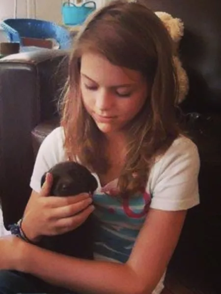 young girl and a puppy