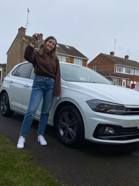 Young woman and her car