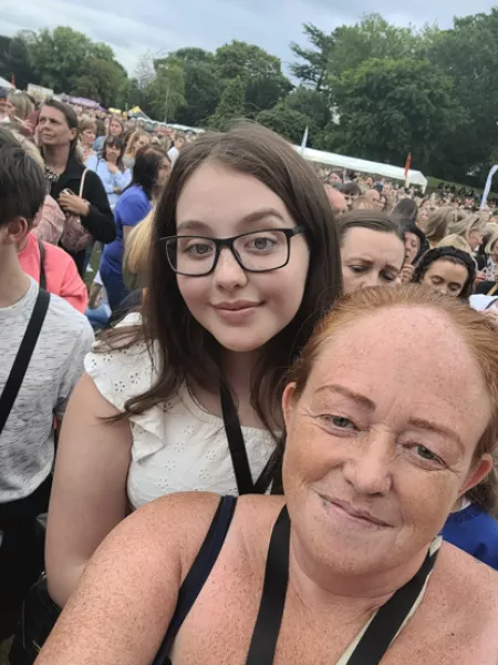 mum and daughter at a concert